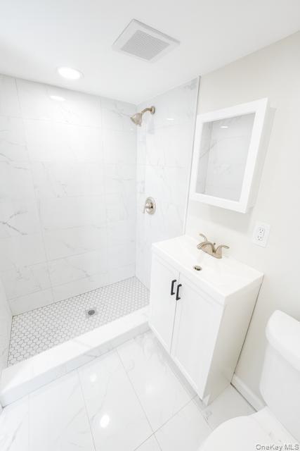 29 Avon Road Hewlett, NY 11557 - Photo 12 of 17 Full bathroom featuring vanity and a stall shower