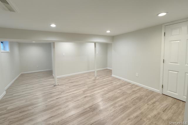 29 Avon Road Hewlett, NY 11557 - Photo 16 of 17 Basement featuring light wood-type flooring and recessed lighting