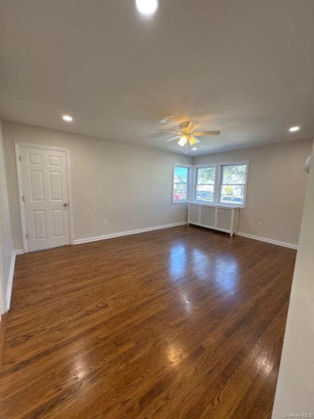 29 Avon Road Hewlett, NY 11557 - Photo 3 of 17 Empty room with recessed lighting, dark wood-style floors, and a ceiling fan