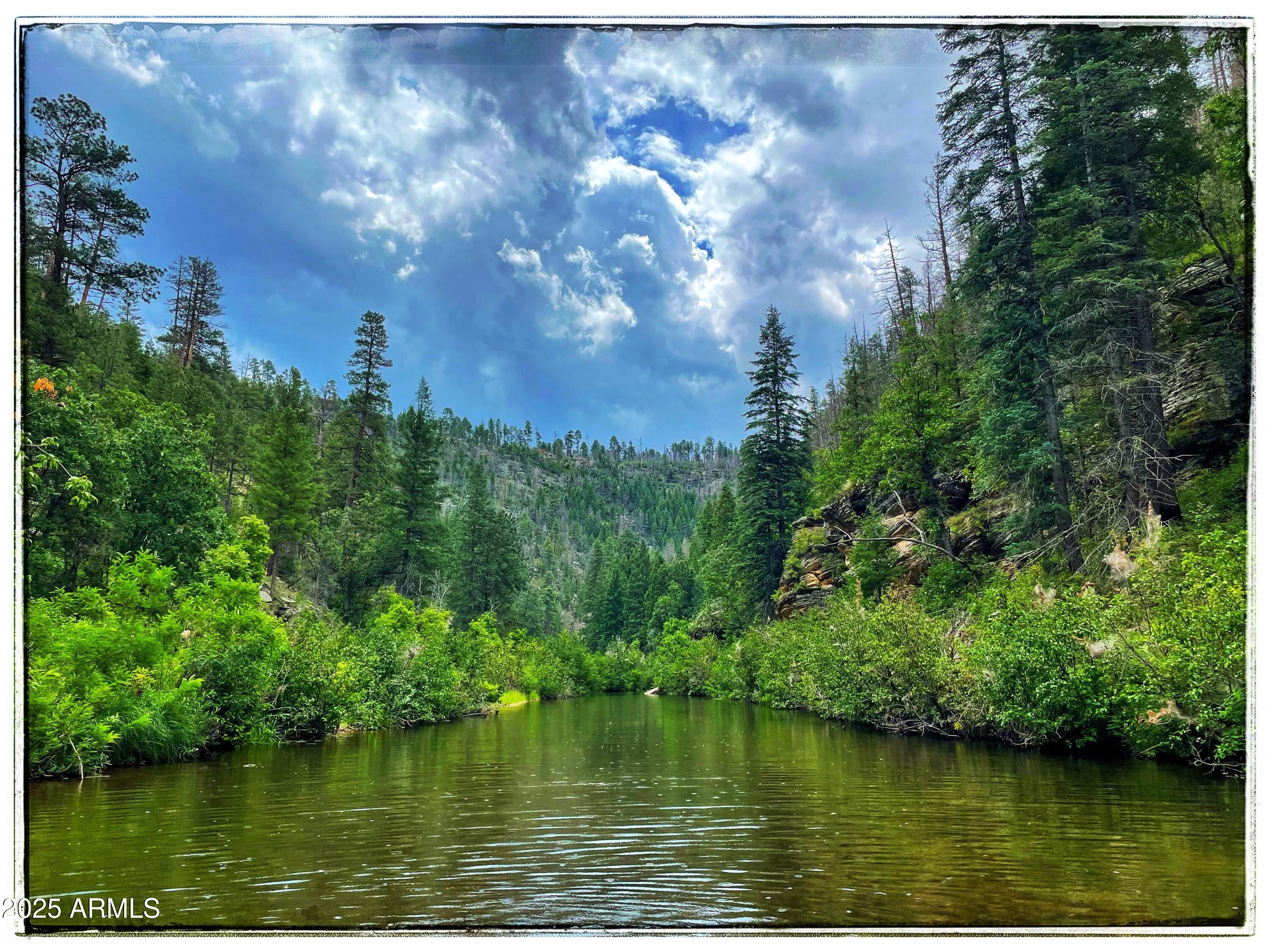5131 Forest Service Road 137A Road, Unit PRCL40375003B A & B Happy Jack, AZ 86024 - Photo 17 of 21 a view of a lake with houses in the background