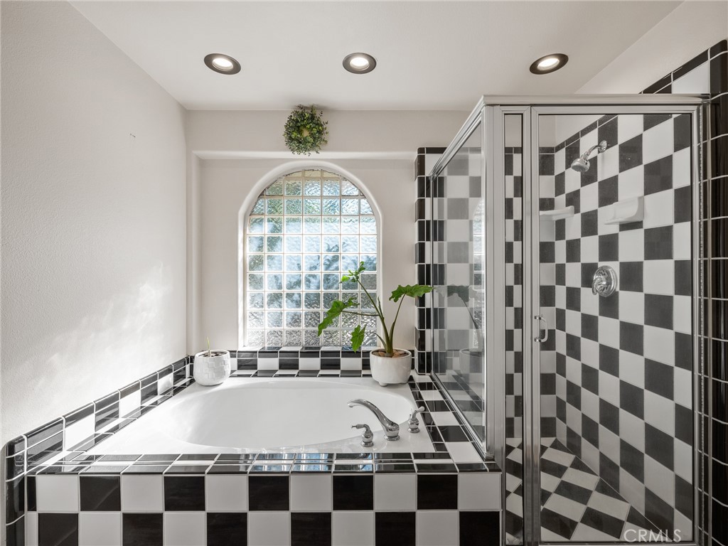 6370 Fremontia Road Hesperia, CA 92344 - Photo 35 of 62 a room with a black white checkered floor and a large window