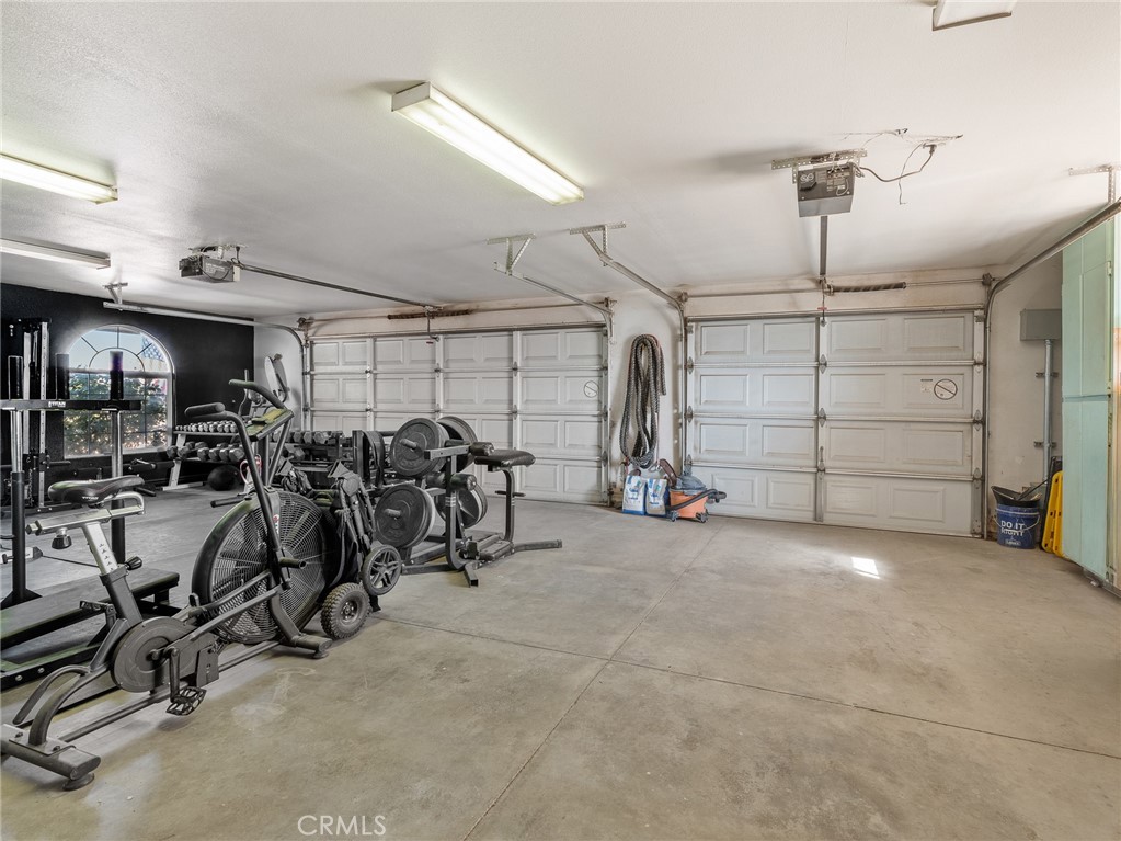 6370 Fremontia Road Hesperia, CA 92344 - Photo 41 of 62 a view of a room with gym equipment