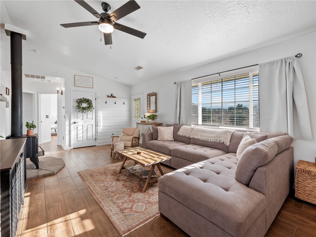 6370 Fremontia Road Hesperia, CA 92344 - Photo 50 of 62 a living room with furniture and a large window