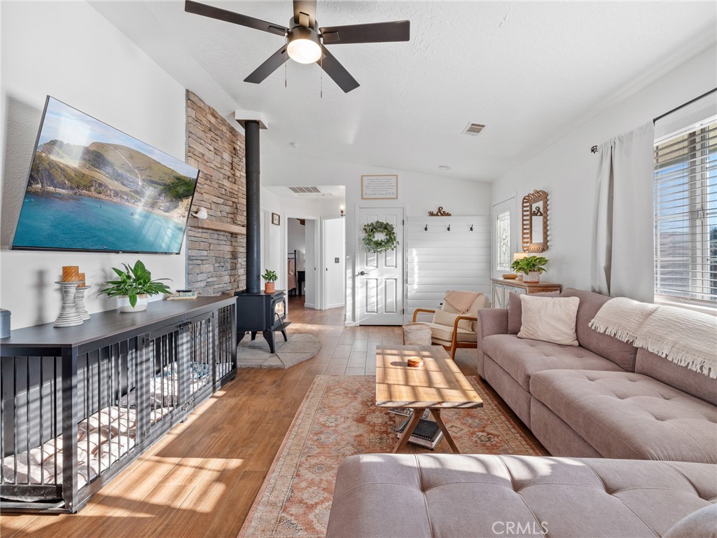 6370 Fremontia Road Hesperia, CA 92344 - Photo 51 of 62 a living room with furniture and a rug