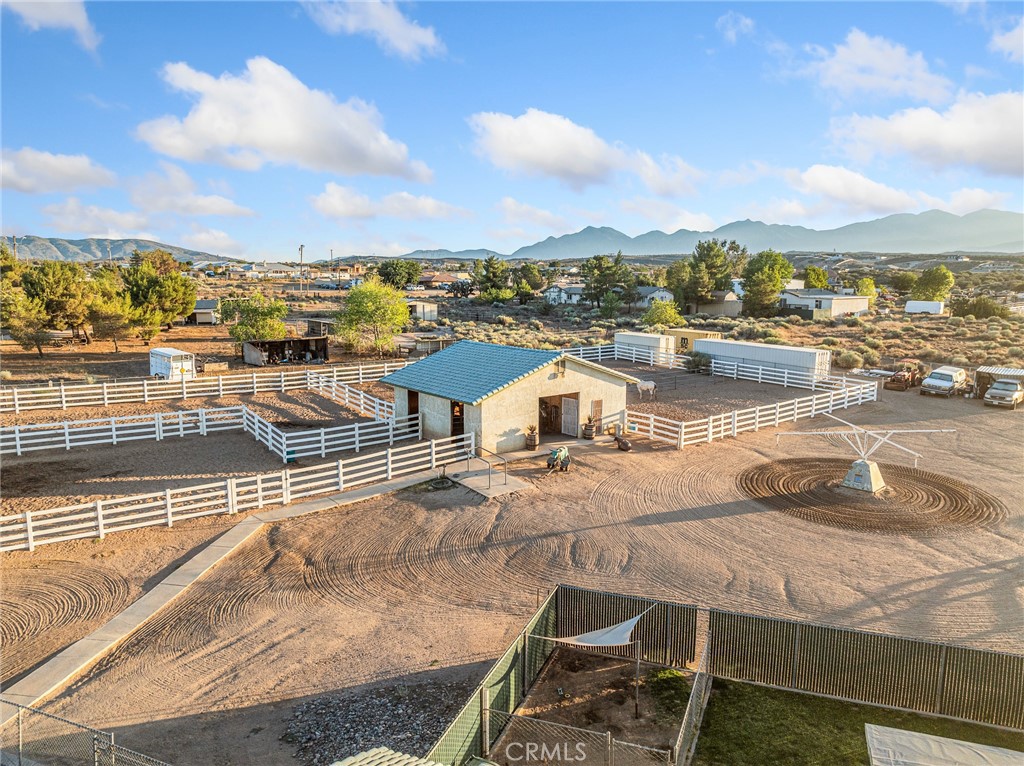 6370 Fremontia Road Hesperia, CA 92344 - Photo 7 of 62 a view of a terrace with lawn chairs