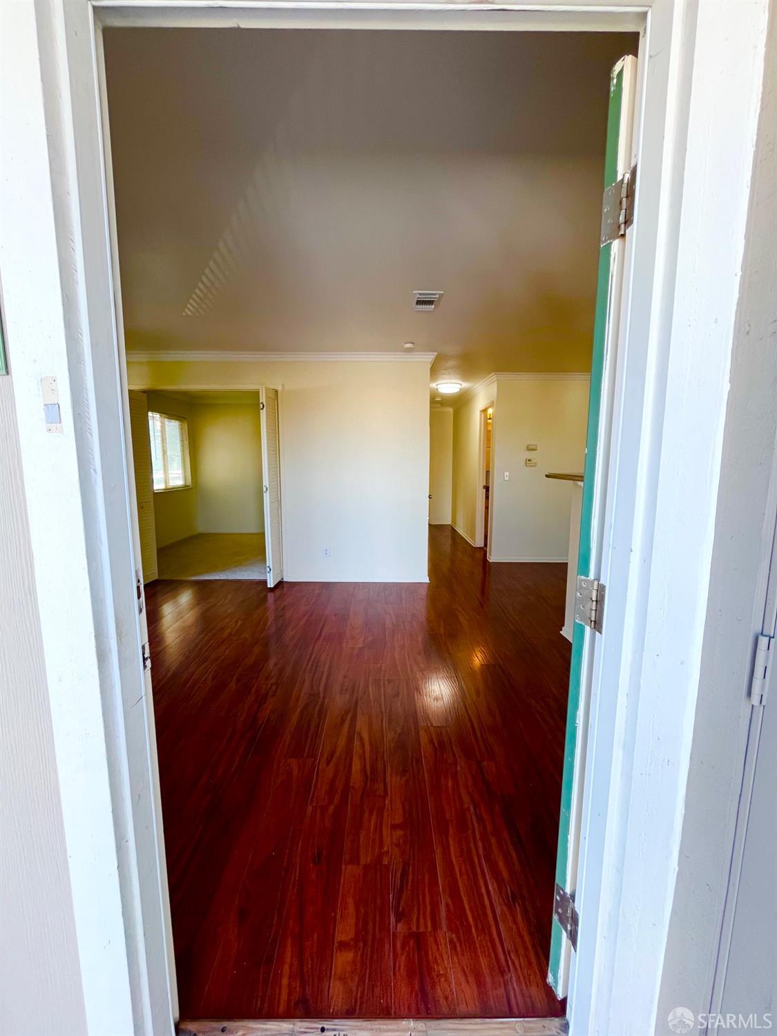 2181 Lakeview Circle Pittsburg, CA 94565 - Photo 1 of 17 a view of a hallway with wooden floor