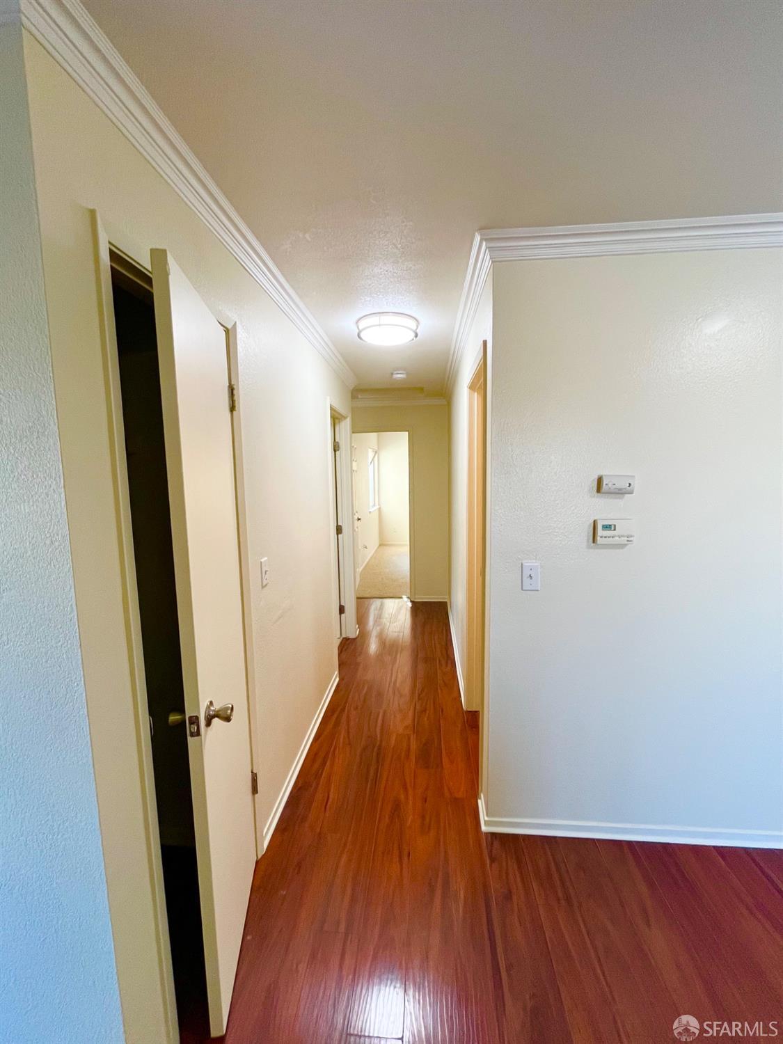 2181 Lakeview Circle Pittsburg, CA 94565 - Photo 7 of 17 a view of a hallway with wooden floor