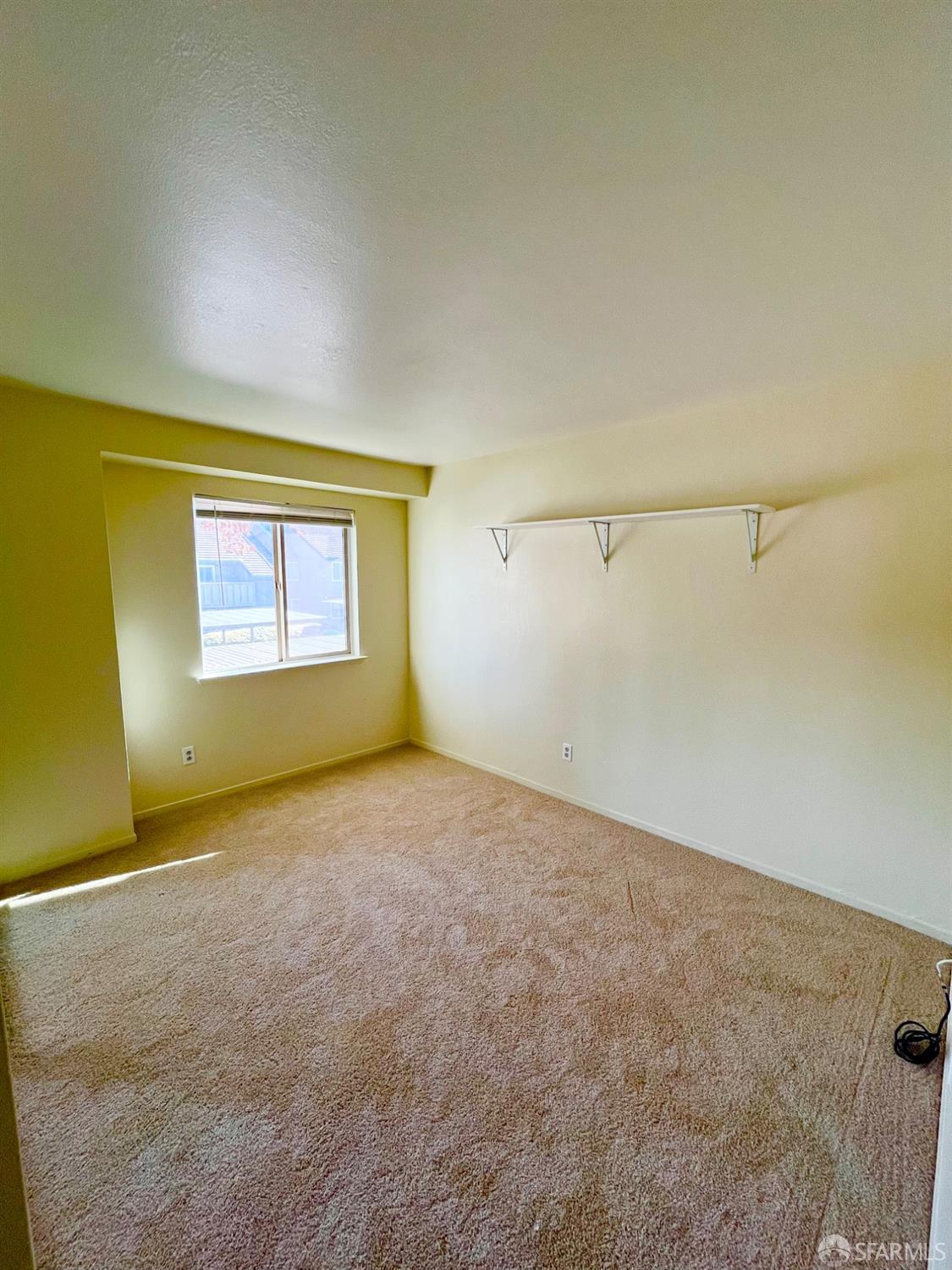 2181 Lakeview Circle Pittsburg, CA 94565 - Photo 10 of 17 a view of an empty room with a window