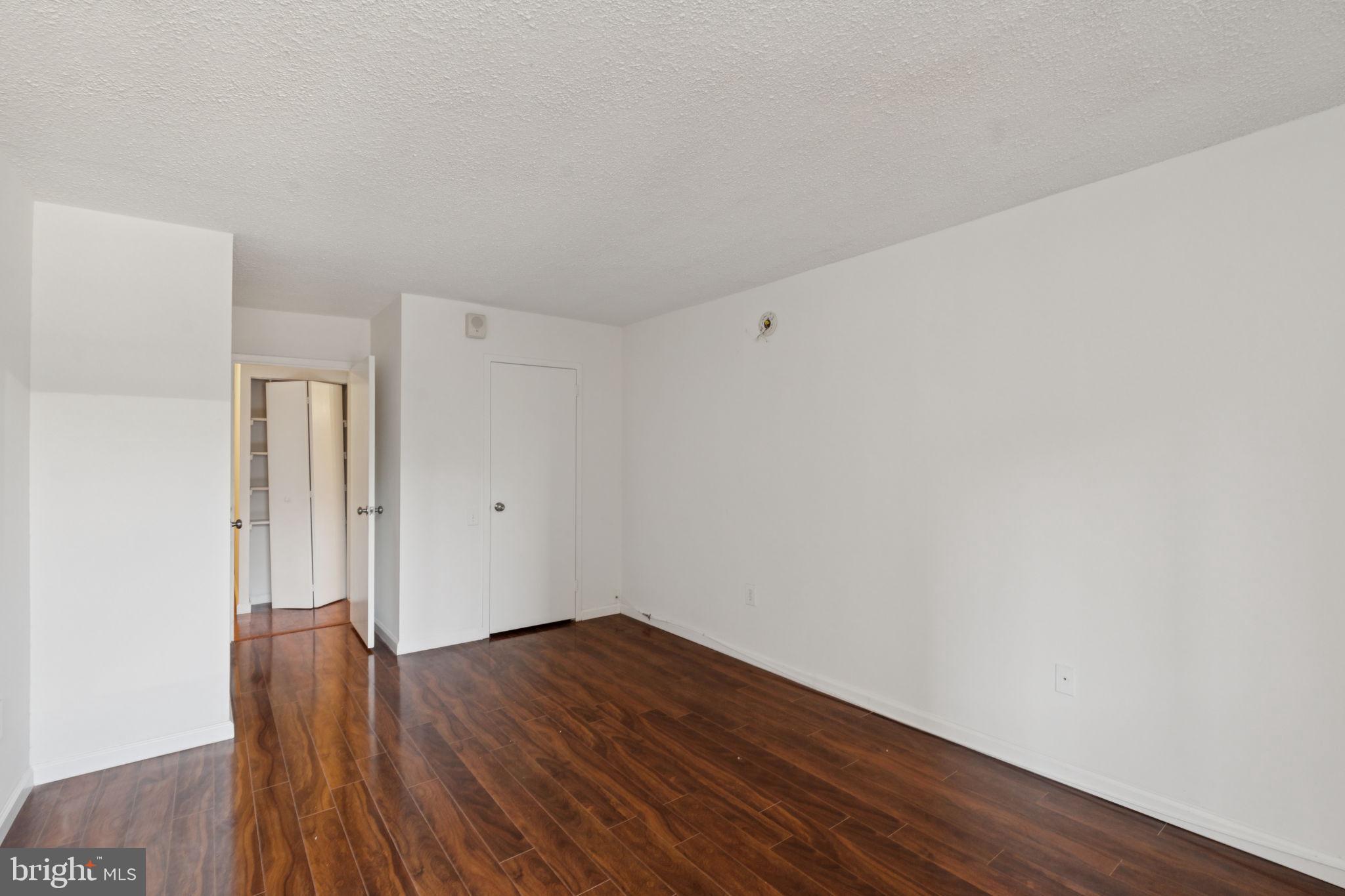 1420 Locust Street, Unit 7L Philadelphia, PA 19102 - Photo 10 of 25 a view of a room with wooden floor