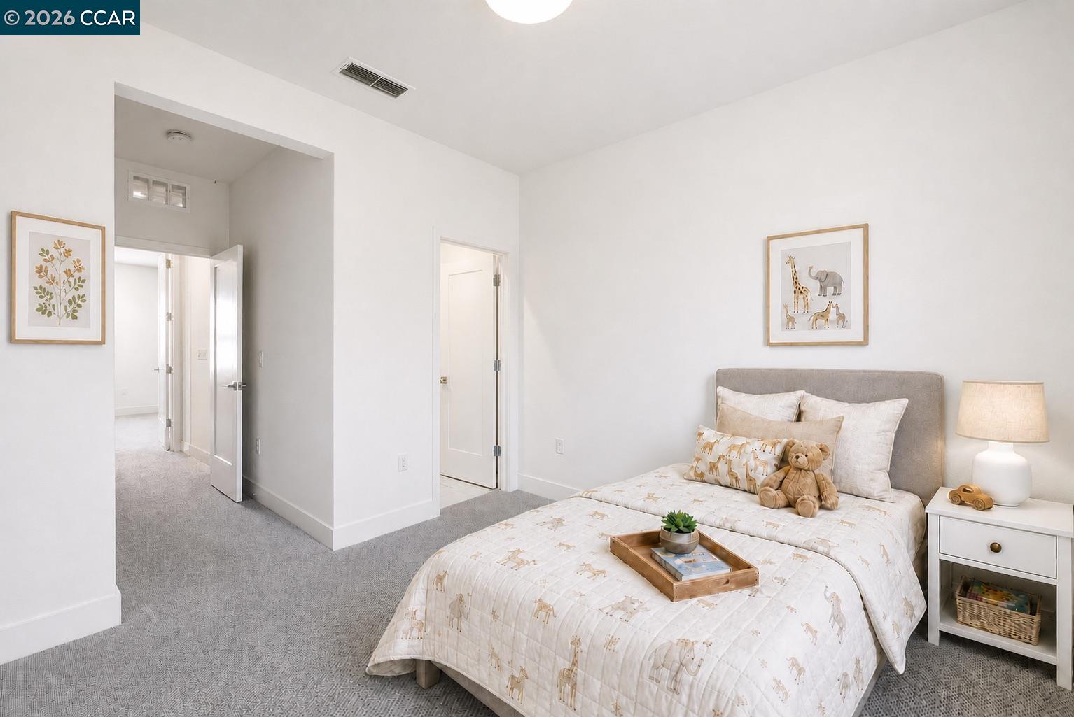 205 Plum Tree Street Livermore, CA 94551 - Photo 7 of 47 a bedroom with a bed and a night stand