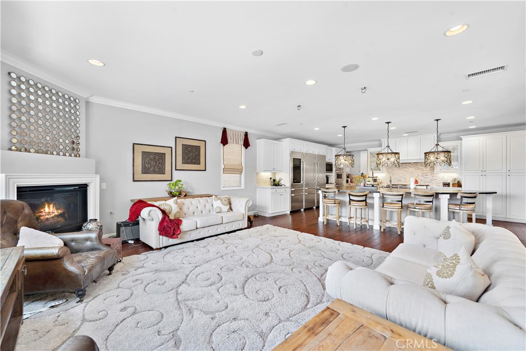 108 Fairgrove Irvine, CA 92618 - Photo 11 of 40 a bedroom with furniture and a fireplace