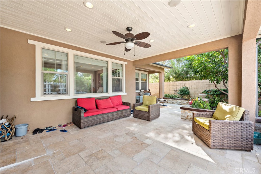 108 Fairgrove Irvine, CA 92618 - Photo 13 of 40 a living room with furniture and floor to ceiling windows