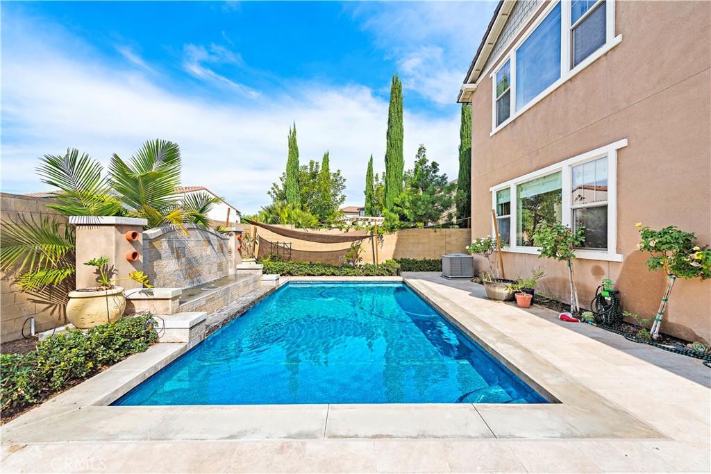 108 Fairgrove Irvine, CA 92618 - Photo 19 of 40 a swimming pool with outdoor seating and yard