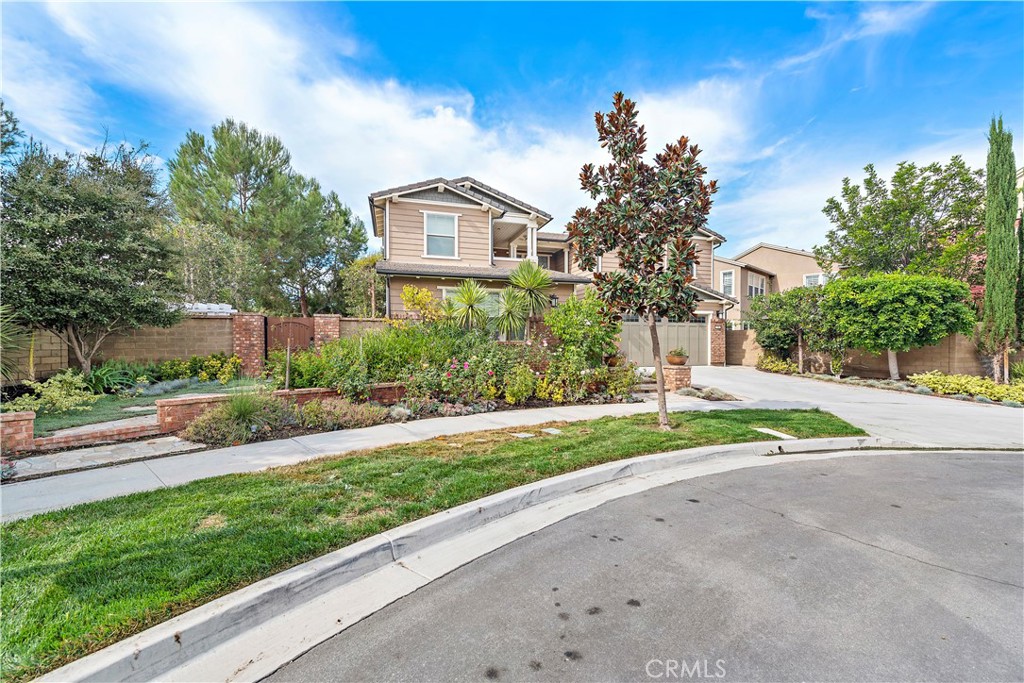 108 Fairgrove Irvine, CA 92618 - Photo 2 of 40 a house view with a garden space