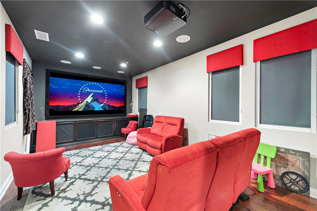 108 Fairgrove Irvine, CA 92618 - Photo 24 of 40 a living room with furniture and a flat screen tv