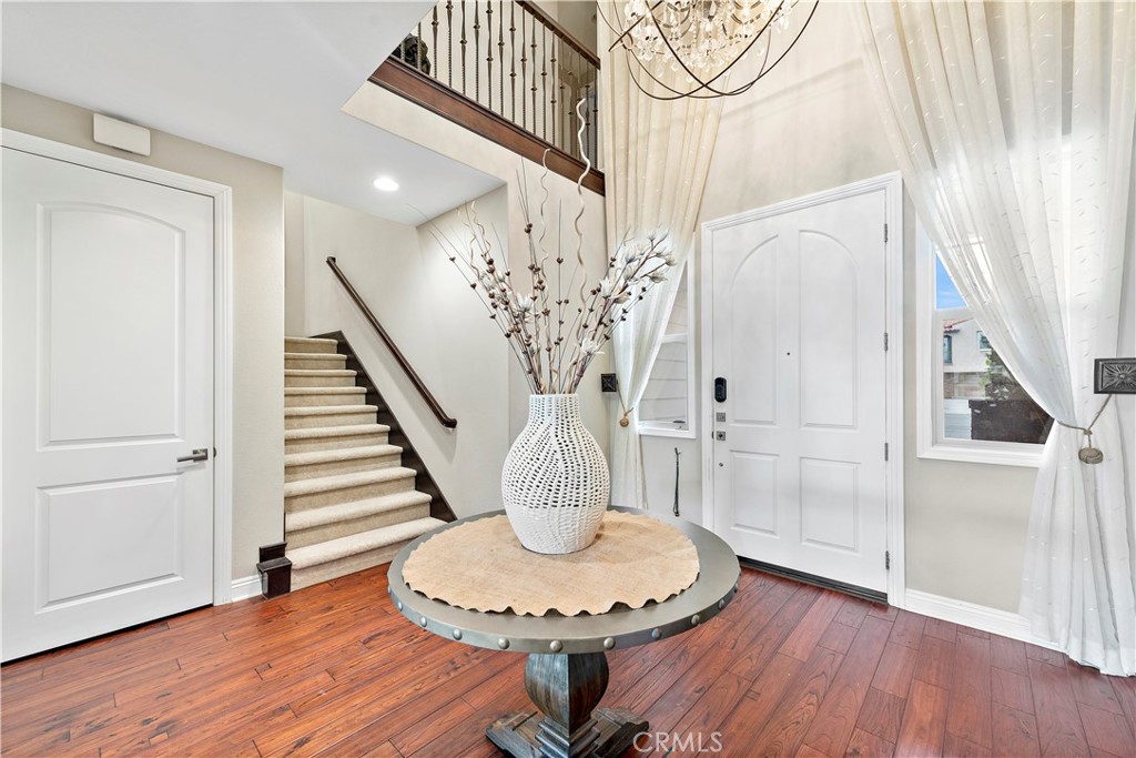 108 Fairgrove Irvine, CA 92618 - Photo 3 of 40 a view of a livingroom with furniture and wooden floor
