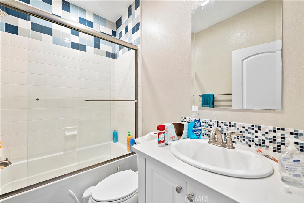 108 Fairgrove Irvine, CA 92618 - Photo 33 of 40 a bathroom with a sink toilet and shower