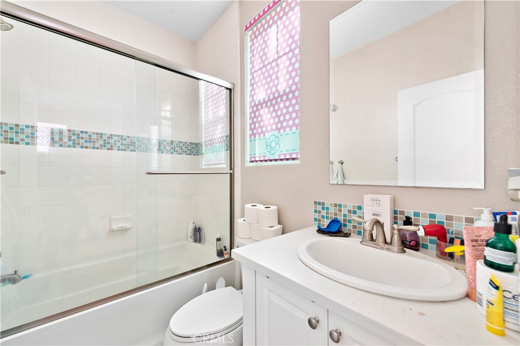 108 Fairgrove Irvine, CA 92618 - Photo 35 of 40 a bathroom with a sink toilet and shower