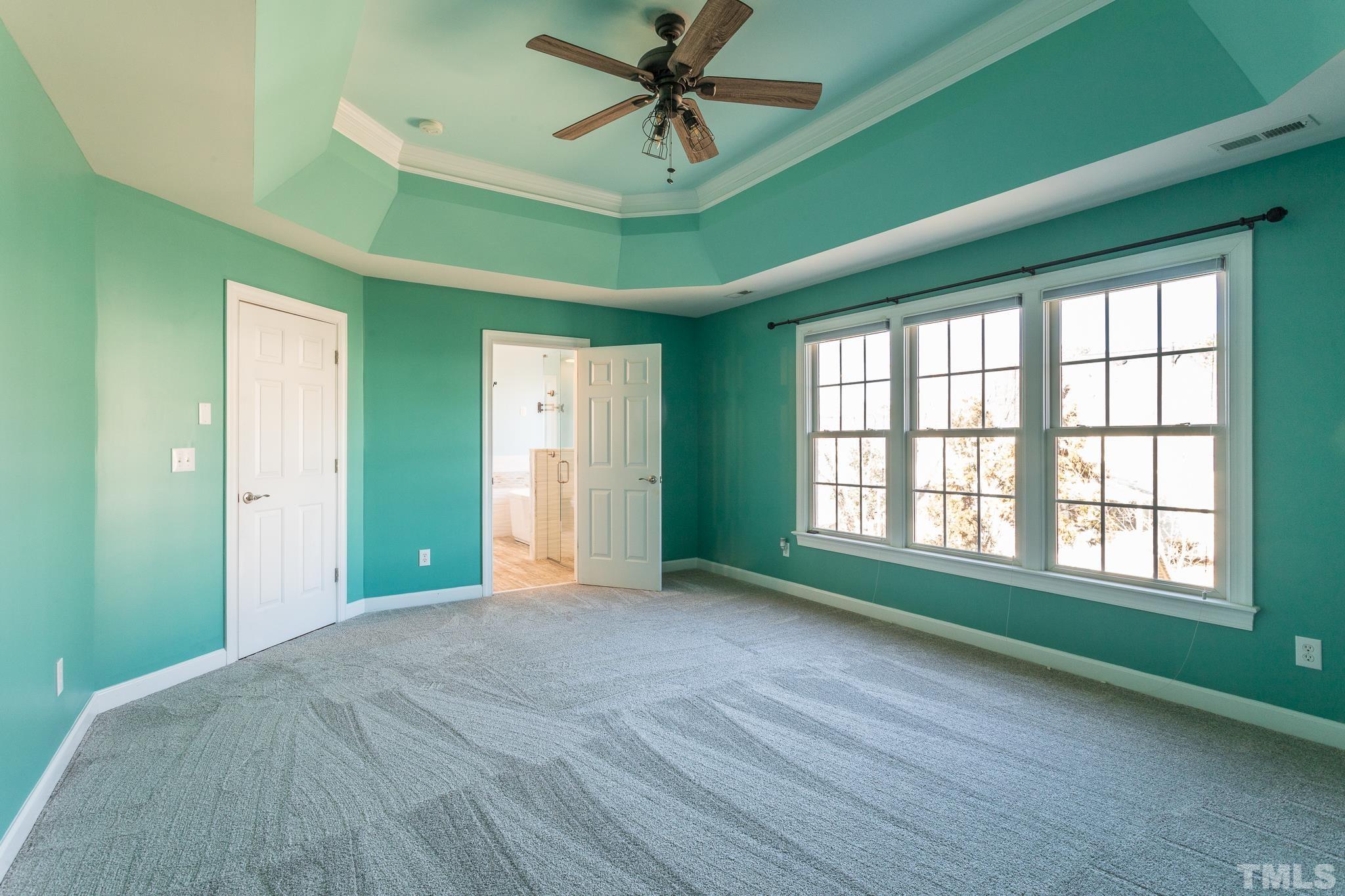 6023 Clapton Drive Wake Forest, NC 27587 - Photo 22 of 35 a view of a livingroom with a ceiling fan and window