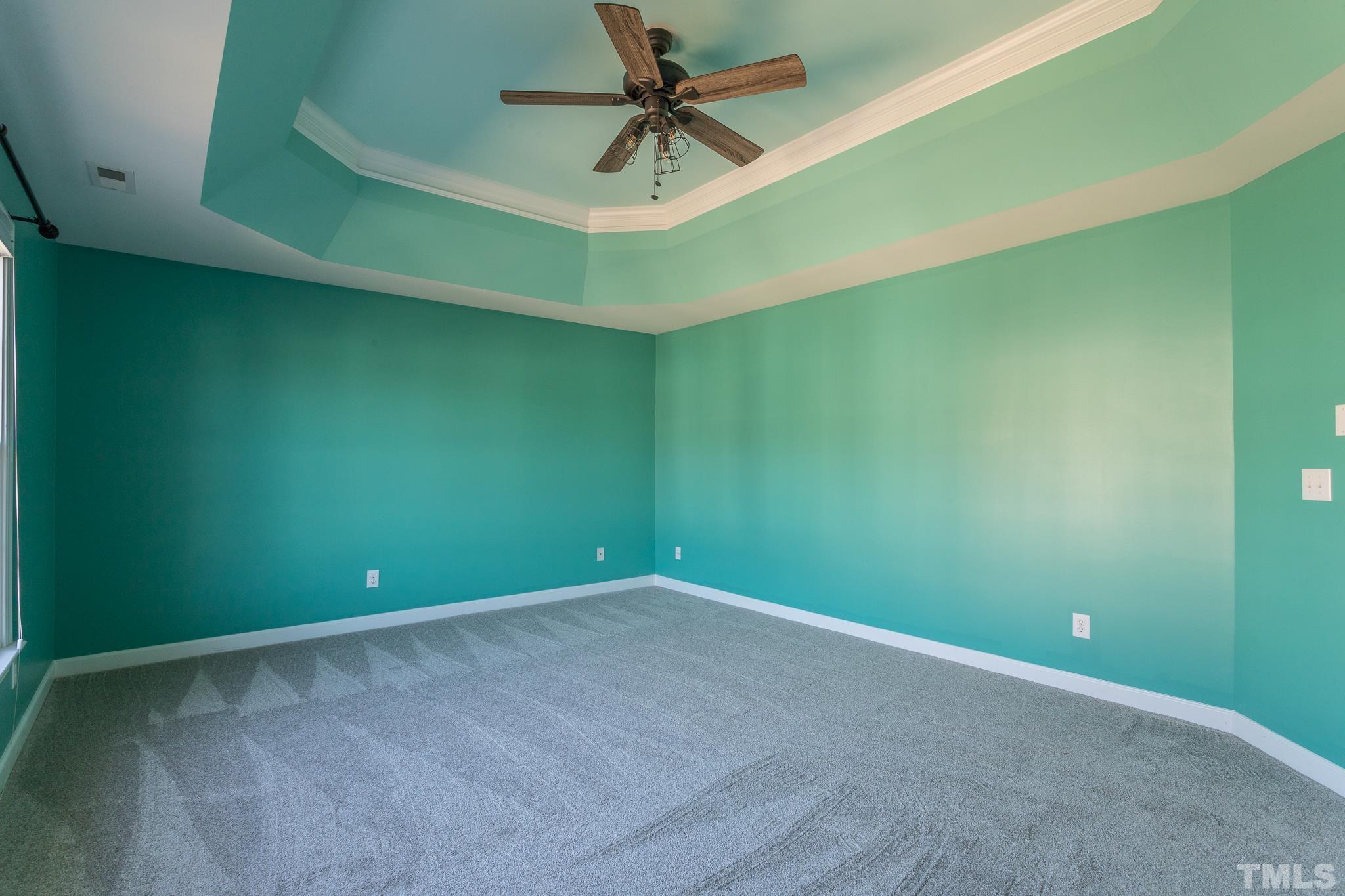 6023 Clapton Drive Wake Forest, NC 27587 - Photo 23 of 35 a view of a room with a fan and a fan