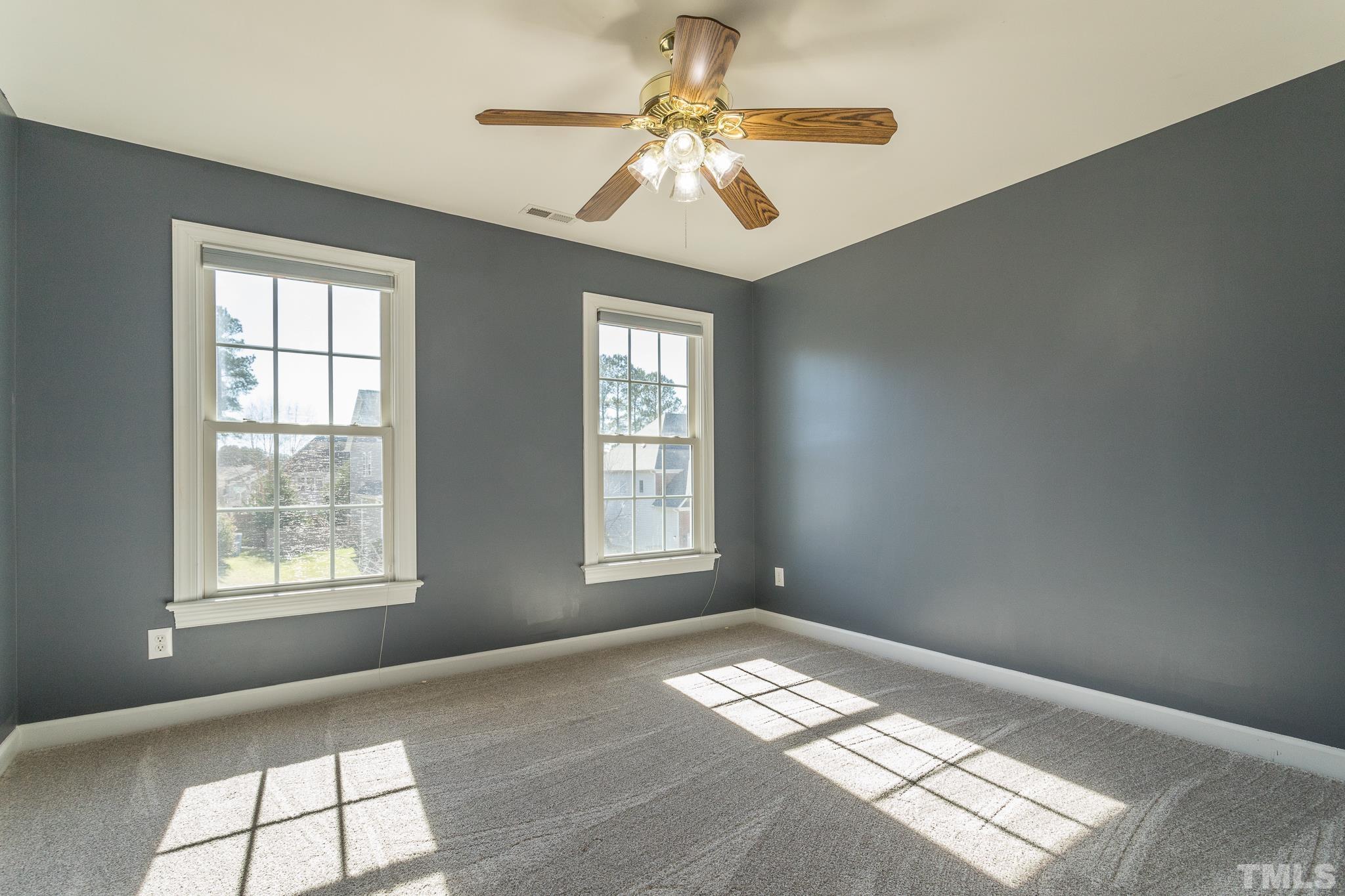 6023 Clapton Drive Wake Forest, NC 27587 - Photo 28 of 35 a view of an empty room with a window