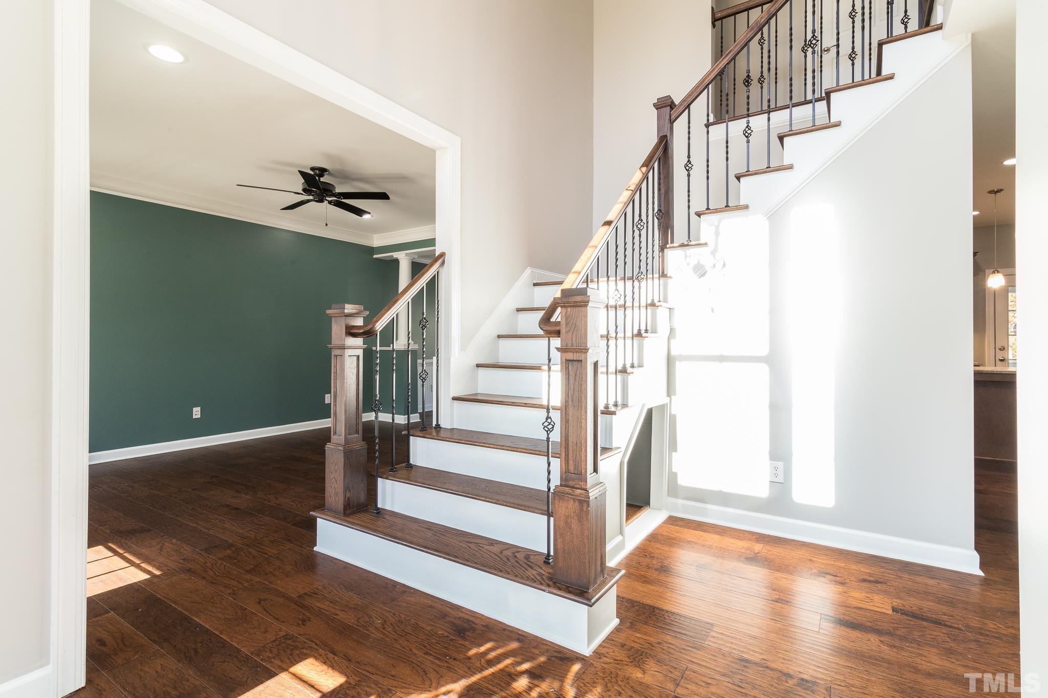 6023 Clapton Drive Wake Forest, NC 27587 - Photo 3 of 35 a view of entryway and hall with wooden floor
