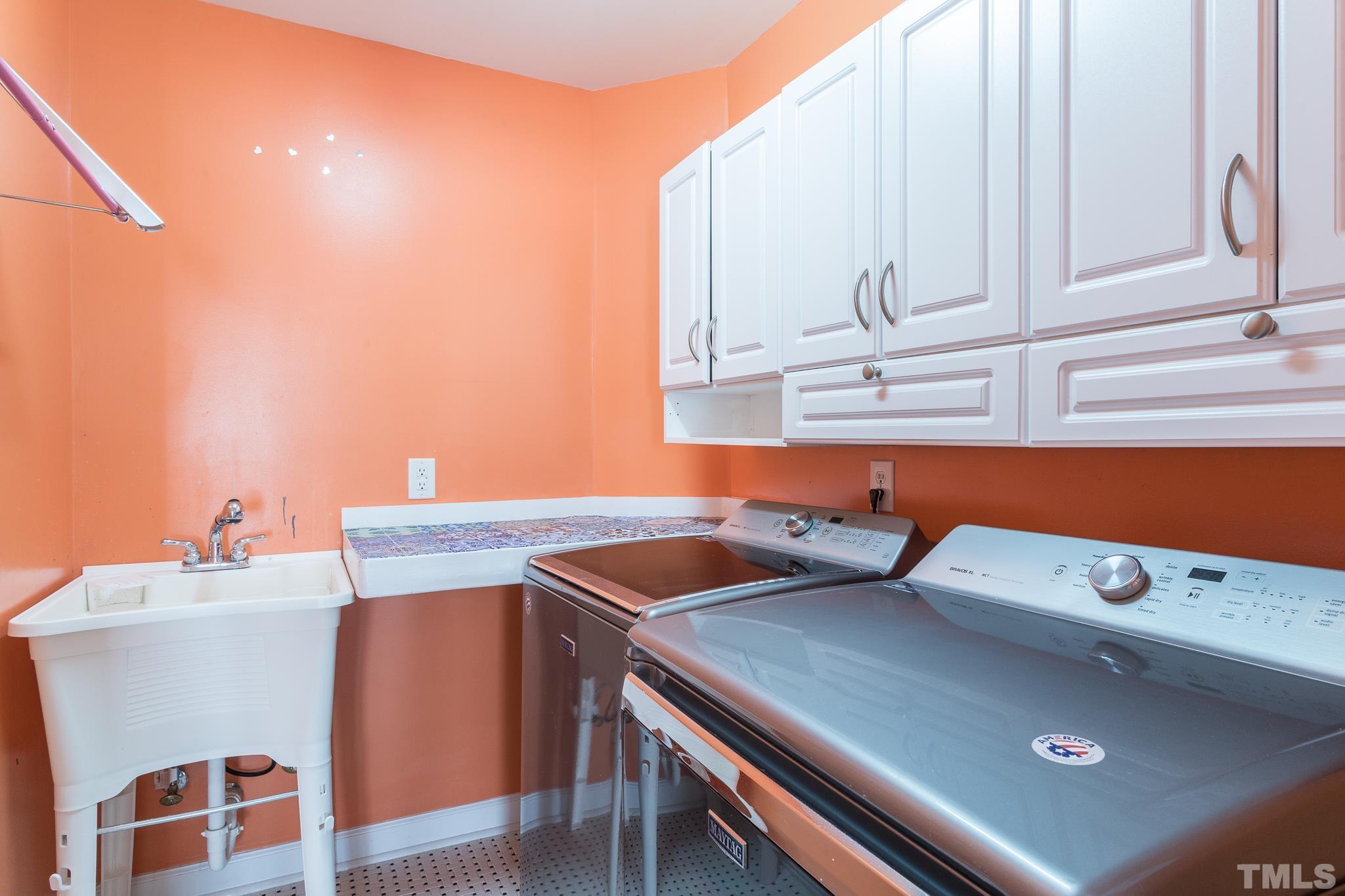 6023 Clapton Drive Wake Forest, NC 27587 - Photo 32 of 35 a utility room with dryer and washer