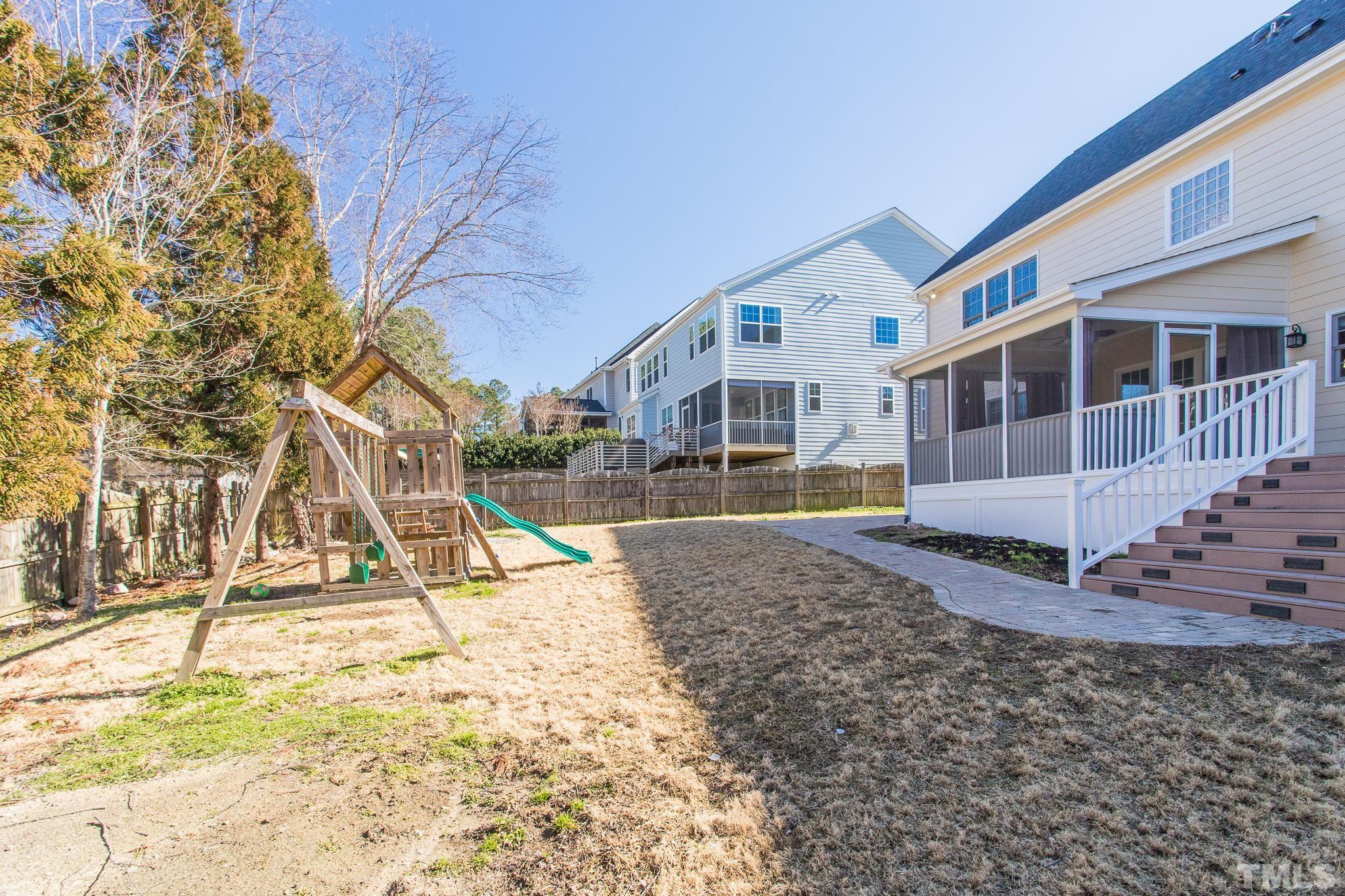 6023 Clapton Drive Wake Forest, NC 27587 - Photo 33 of 35 a view of a house with a backyard