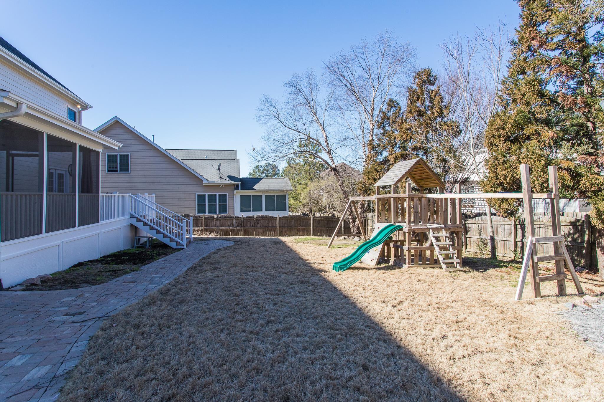 6023 Clapton Drive Wake Forest, NC 27587 - Photo 35 of 35 a view of a house with backyard