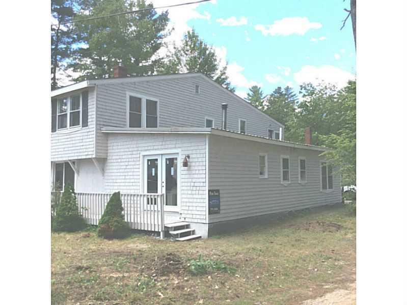 69 West Shore Road Sebago, ME 04029 - Photo 2 of 12 Exterior Side View.