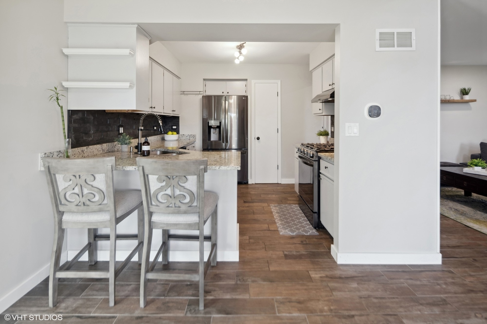 449 Wenbriar Square Addison, IL 60101 - Photo 9 of 35 a view of kitchen with furniture and wooden floor