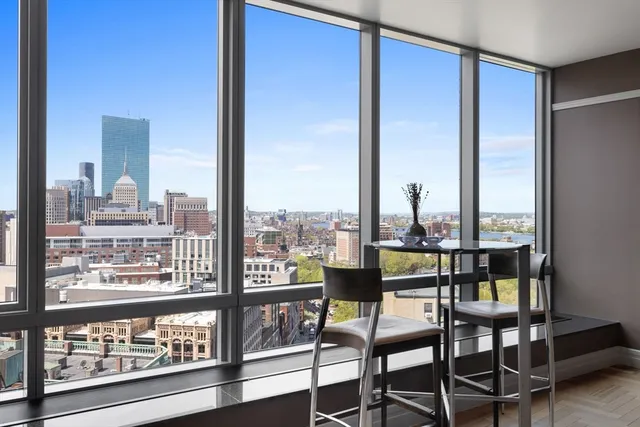 a view of a city from a dining room