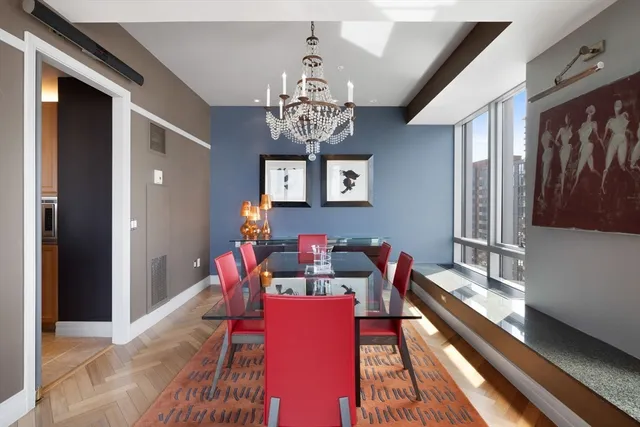 a dining room with a chandelier