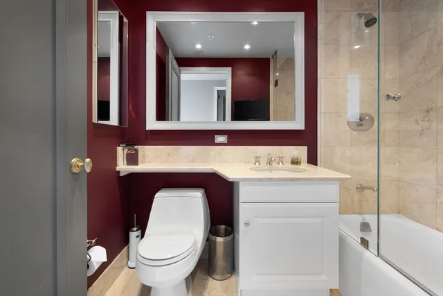 a dining hall with a large window and table