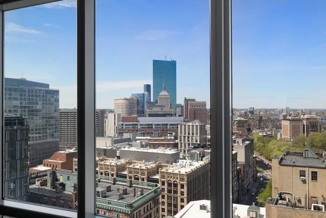 a city view with tall buildings