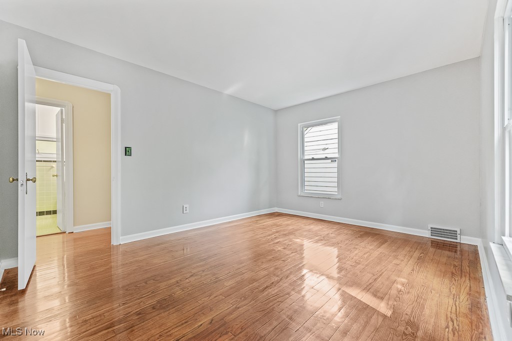9049 Prospect Road Strongsville, OH 44149 - Photo 19 of 50 Unfurnished room with hardwood / wood-style flooring
