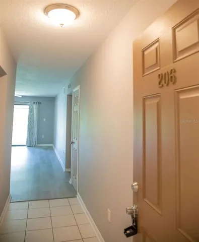 a view of a hallway with closet