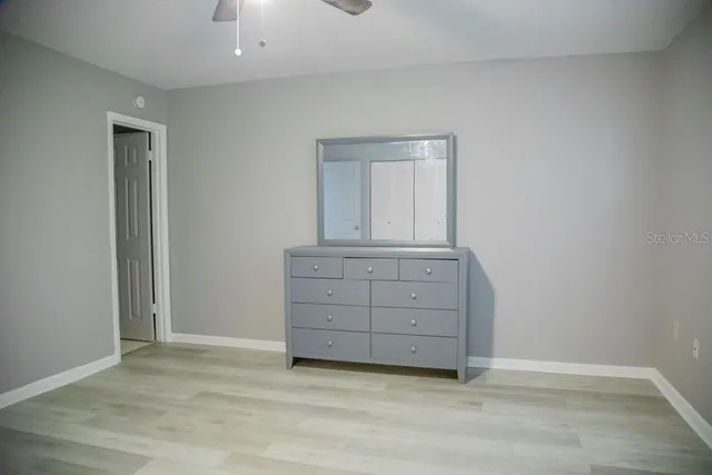 wooden floor and cabinet in a room