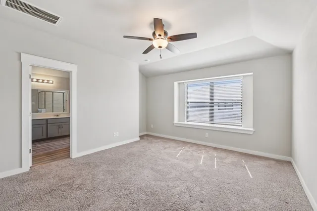 a bathroom with a double vanity sink a mirror and a shower