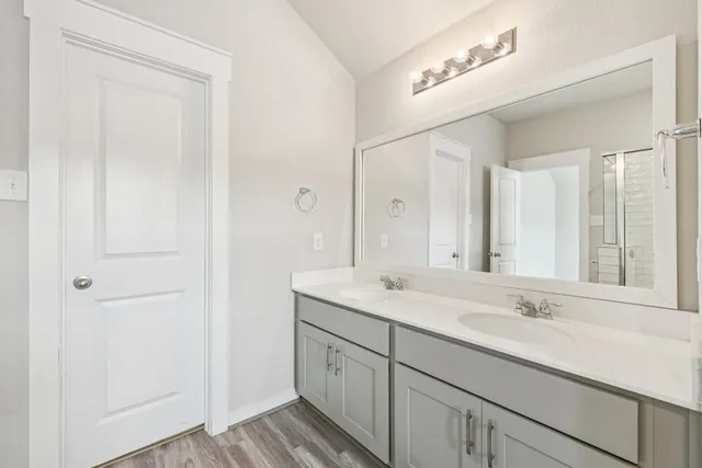 a view of storage and utility room with washer and dryer