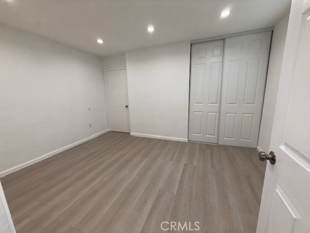 18419 Tuba Street Northridge, CA 91325 - Photo 10 of 15 a view of a livingroom with wooden floor