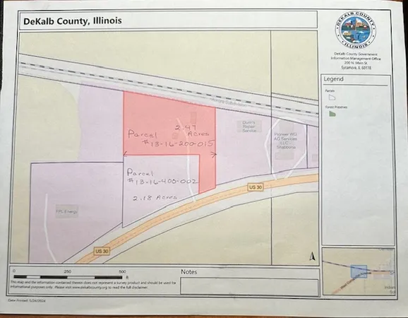 a view of a kitchen with wooden floor