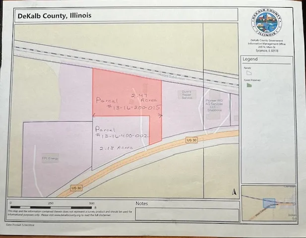 a view of a kitchen with wooden floor