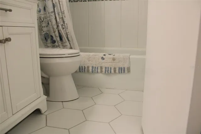 a view of balcony with wooden floor