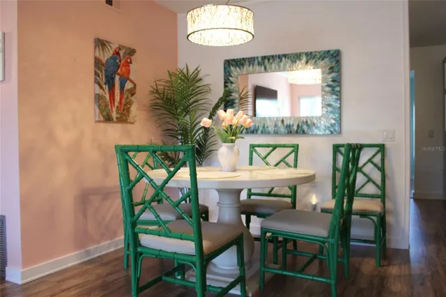 a room with furniture and a potted plant