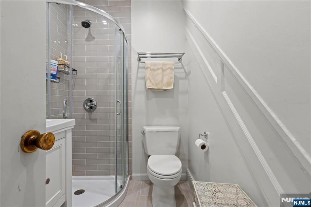 436 Undercliff Avenue, Unit 1 Edgewater, NJ 07020 - Photo 8 of 16 a bathroom with a toilet and a shower