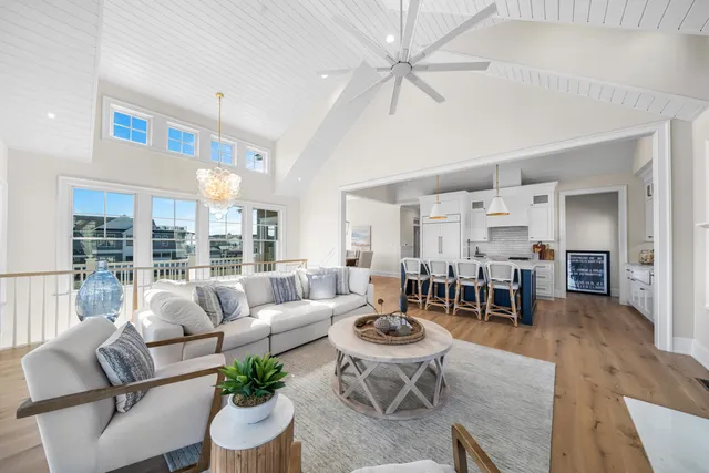 a large kitchen with a table and chairs in it