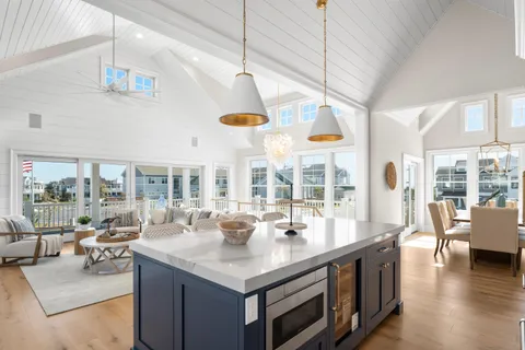 a kitchen with a sink cabinets and appliances