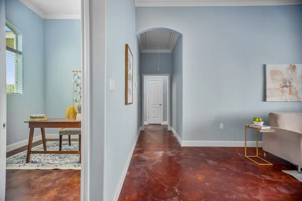 a living room with furniture and a window