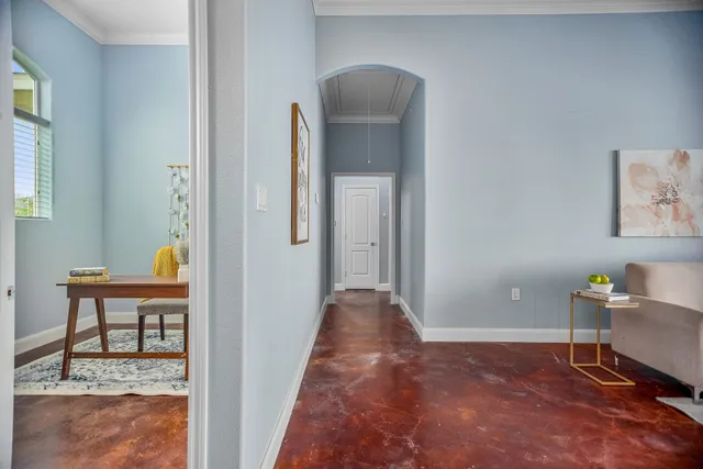 a living room with furniture and a window